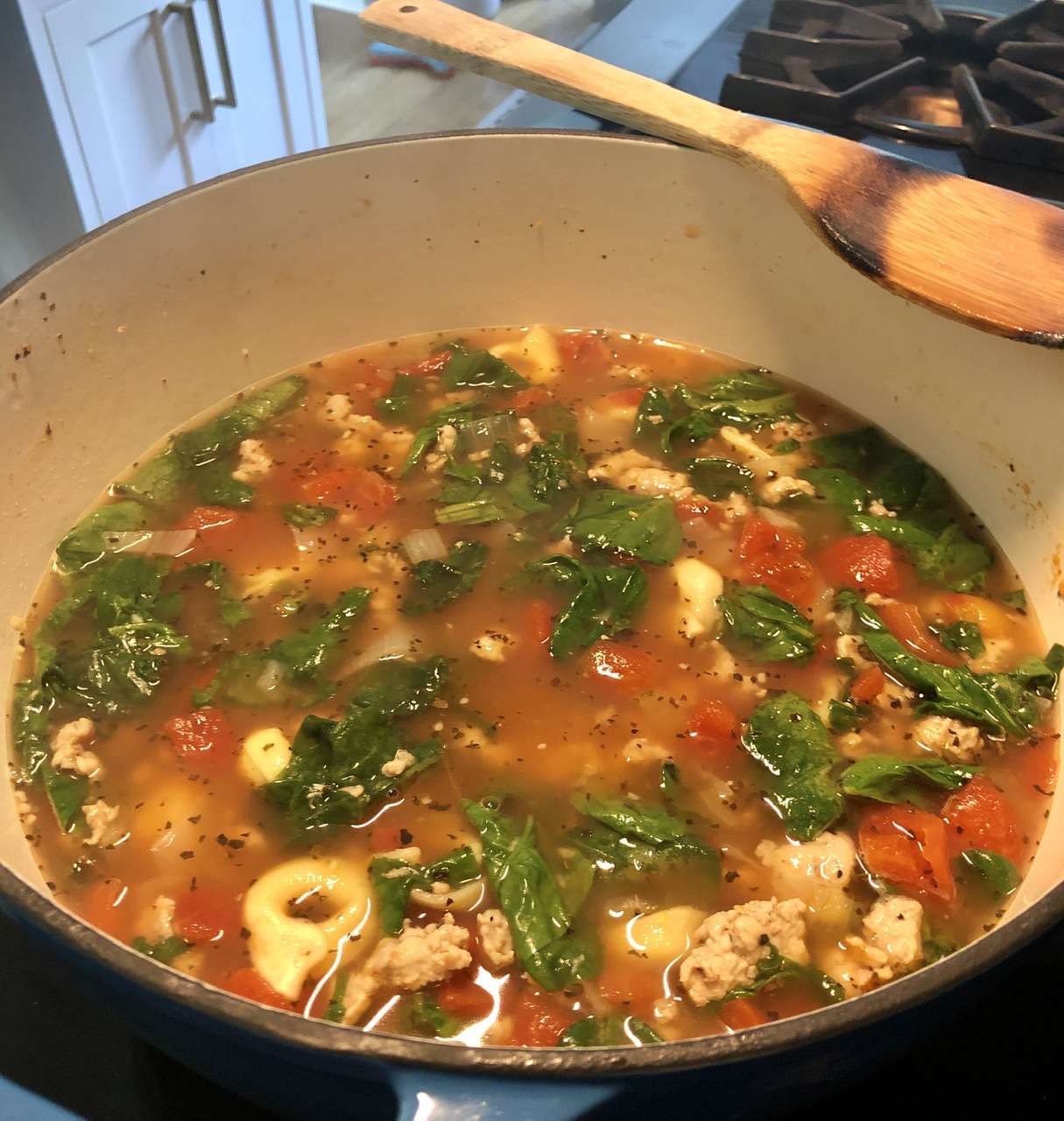 Garlicky Tortellini Soup With Sausage, Tomatoes, and Spinach Recipe